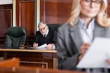 Judge Reading an Article